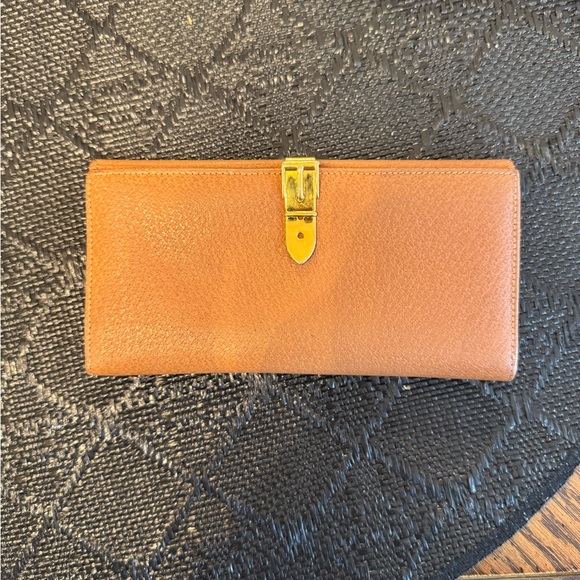 Gucci Handbags - Gucci Bifold Tan and Brown Leather Womens Wallet with Gold Clasp